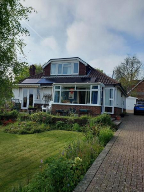 Double room with ensuite shower room in quiet, private house